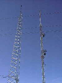 The completed tower next to the old painted one.